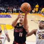 Russell Leads Lakers to Easy Win Over Blazers